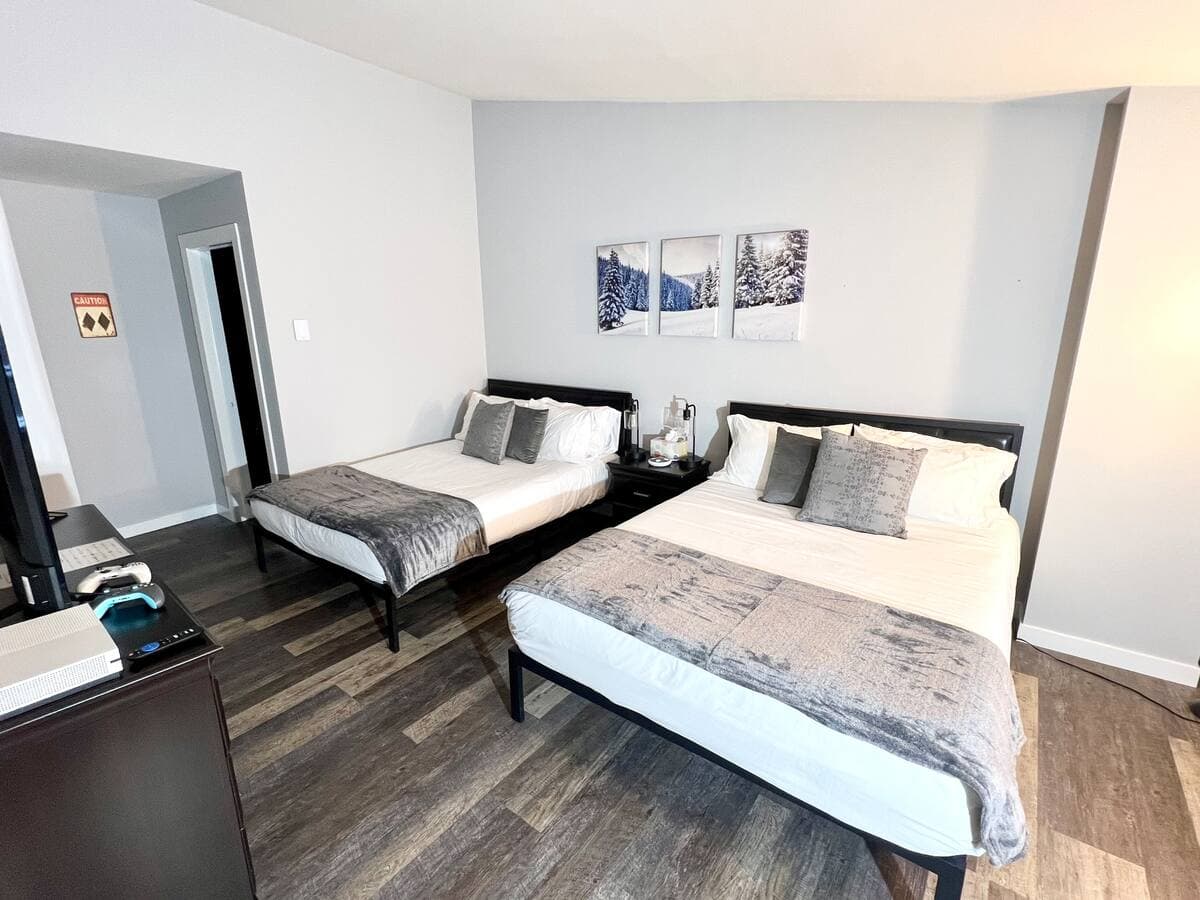 Bedroom 2 with home arcade games